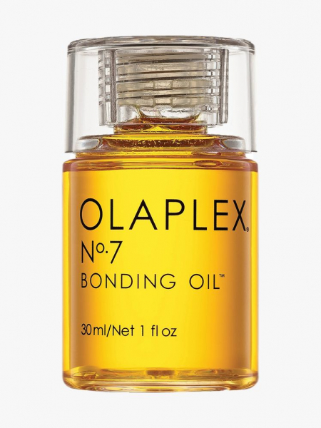 Olaplex No. 7 Bonding Oil bottle of gold hair oil on light gray background