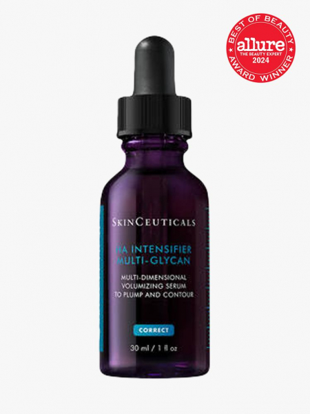 serum in branded purple bottle with black pipette on light gray background with red and white 2024 allure best of beauty seal